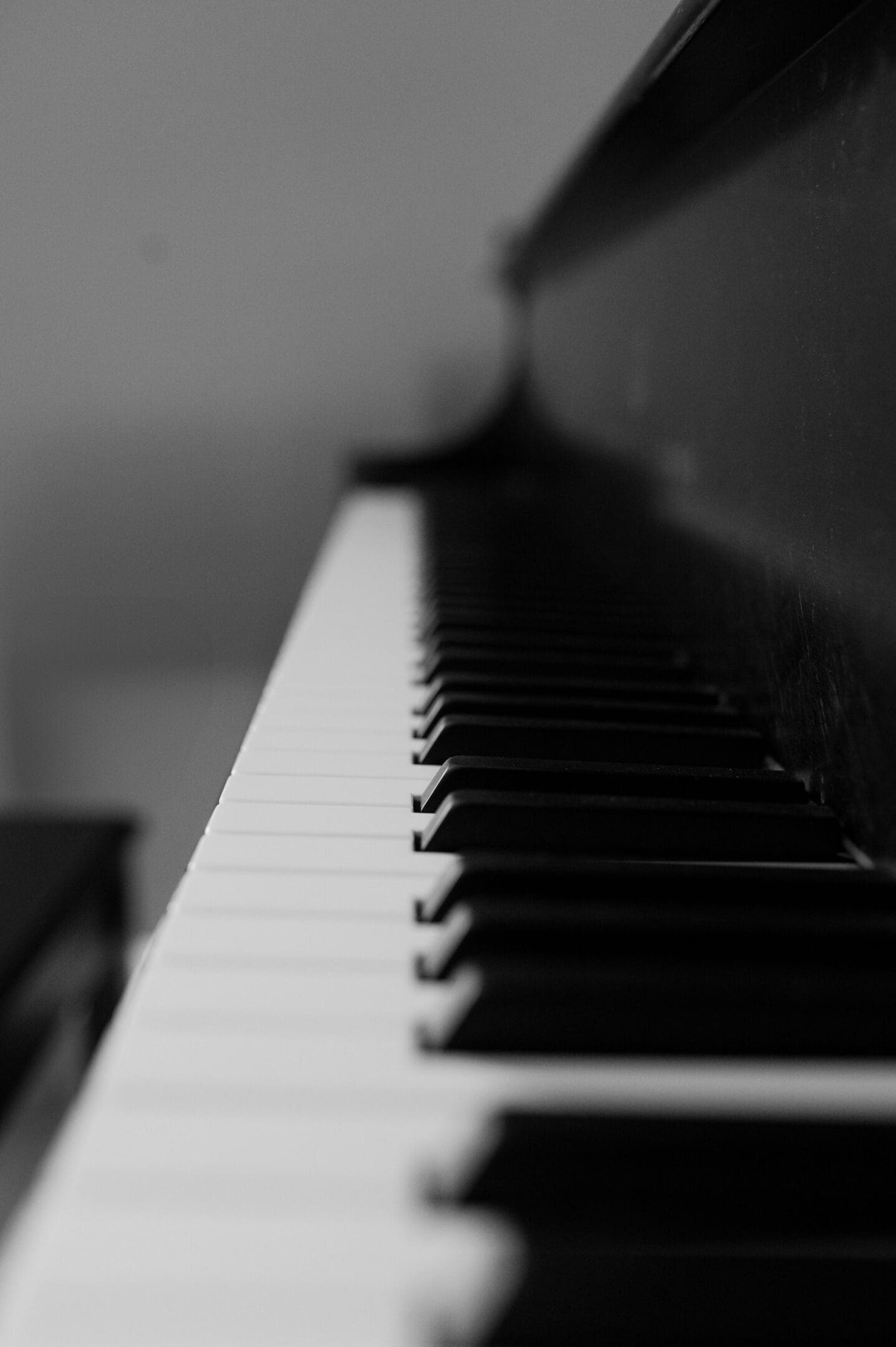 Close-up of piano keys in black and white.